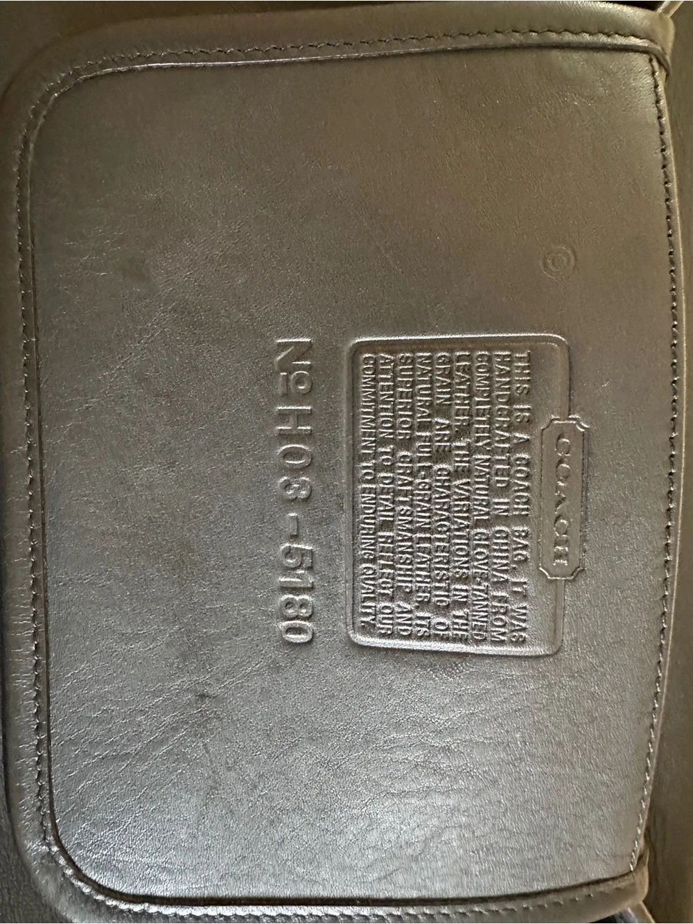Coach sleek black